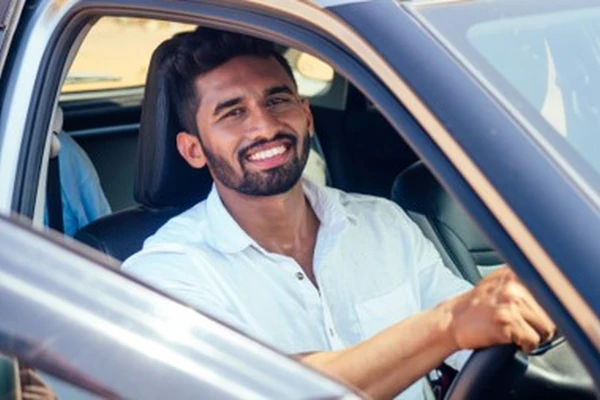 Professional local driver ready for private car hire in Dubai with Arabiers Holidays