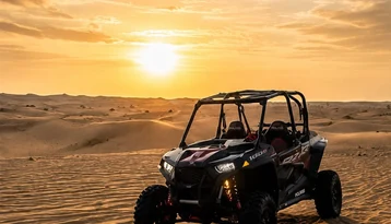 Polaris buggy in the Abu Dhabi desert at sunset