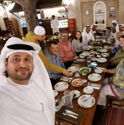 Sultan Karrani hosting Arabiers guests for a traditional Emirati dining experience at Al Fanar Restaurant in Dubai