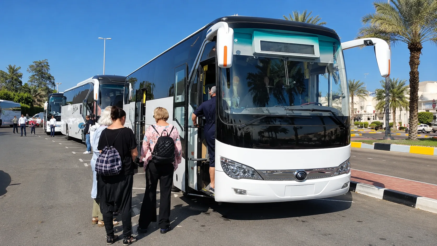 Tourist bus boarding arranged by Arabiers for an Abu Dhabi group programme