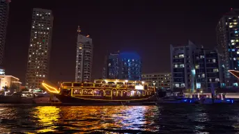 Guests boarding a private yacht charter arranged by Arabiers in Dubai Marina