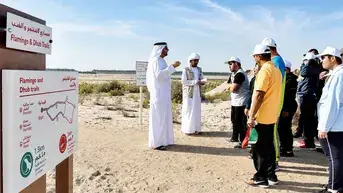 DCT-accredited Emirati guide Sultan Karrani leading a cultural tour