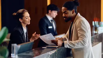 Arabiers contracting manager confirming trade rates with a Dubai hotel