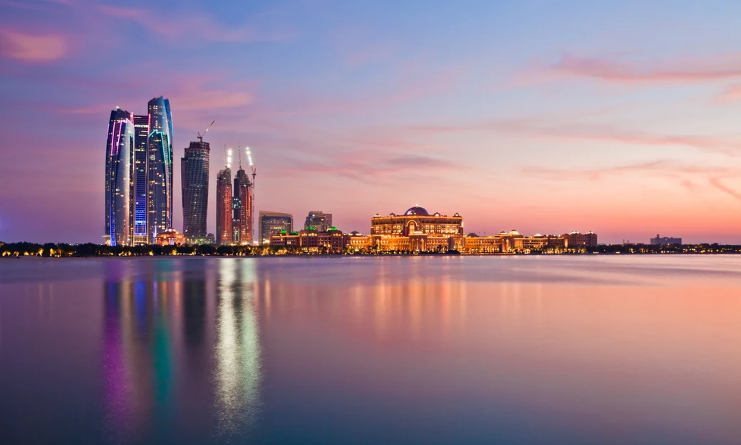 Abu Dhabi skyline and waterfront at dusk