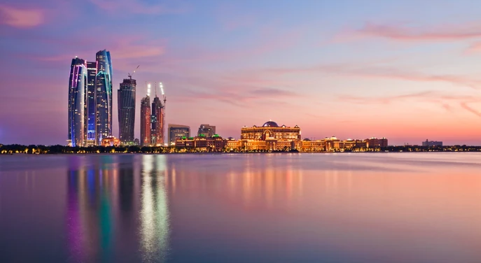 Abu Dhabi skyline and waterfront at dusk