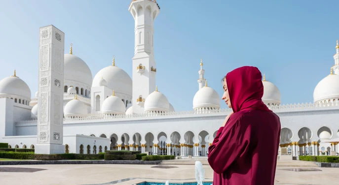 Visitor at Sheikh Zayed Grand Mosque during a private Abu Dhabi half-day city tour