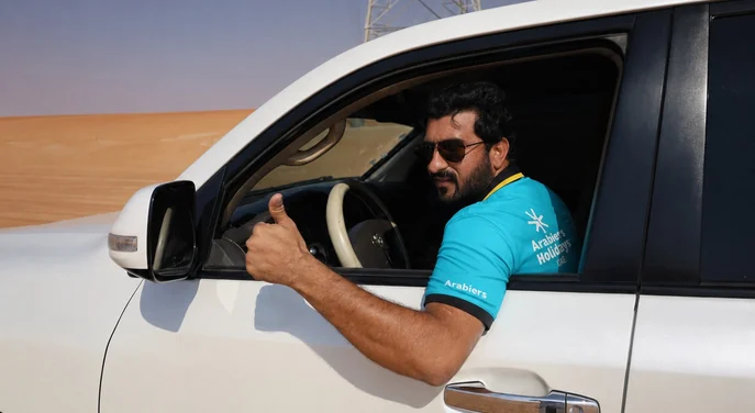 Arabiers desert safari guide ready for the Al Wathba morning tour