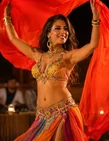 Belly dance performance at an Abu Dhabi evening desert safari camp
