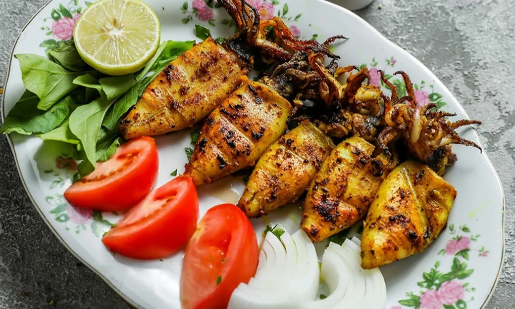 Grilled seafood served during an Emirati lunch