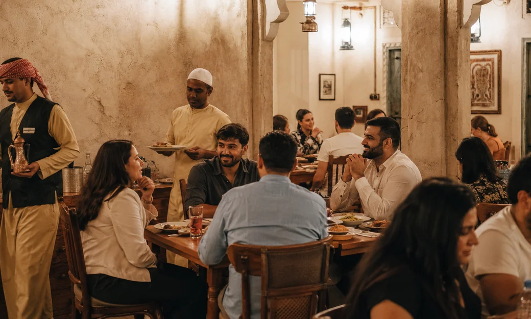 Guests dining at Al Fanar restaurant
