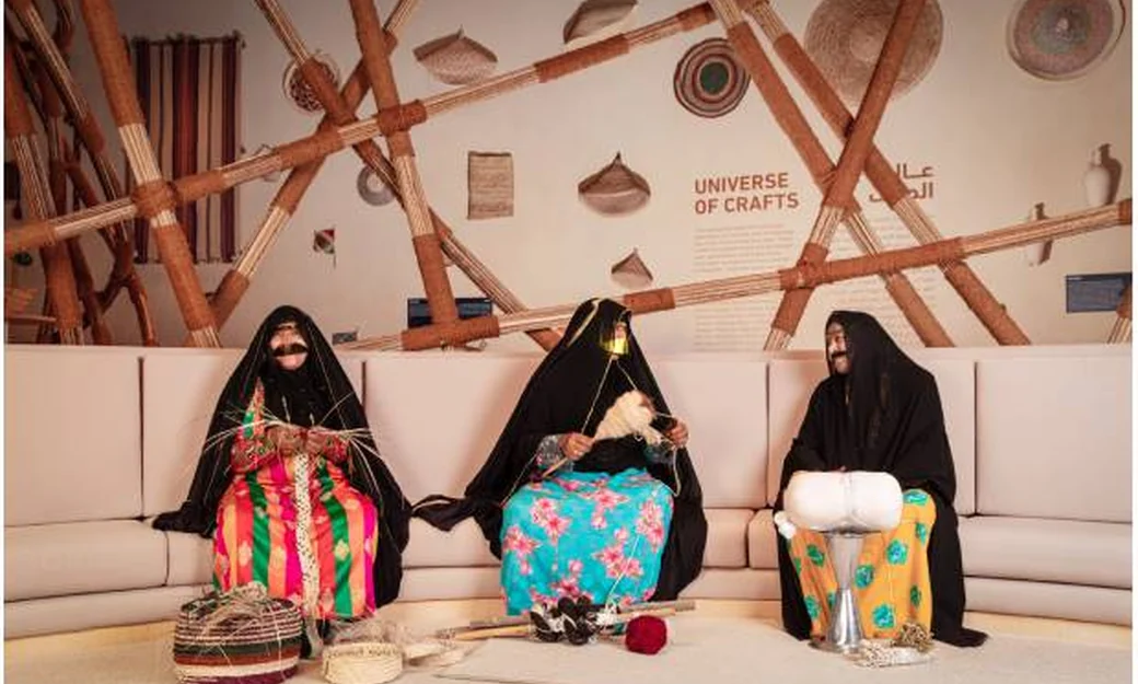 Emirati women demonstrating traditional crafts