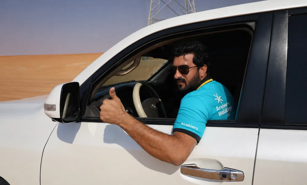 Arabiers Abu Dhabi desert safari driver ready in a private 4x4