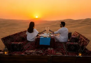 Private desert dinner served at a Sunset Dune Majlis in Abu Dhabi