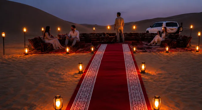 Wide view of a private Royal Red Carpet Majlis with lanterns and a 4x4