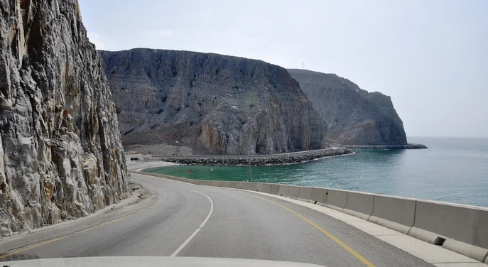 Mountain road overlooking the dramatic coastline near Khor Najid in Musandam