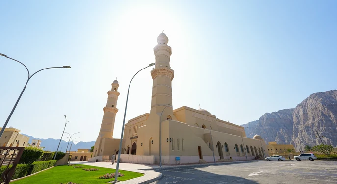 Sultan Qaboos Mosque in Khasab with Musandam mountains in the background