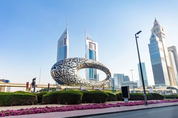Traditional Emirati heritage site with palm trees and courtyard