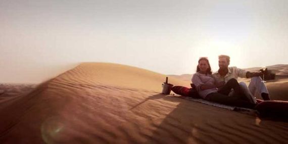 Champagne on top of a dune to Liwa Dune Sunset Champagne