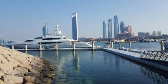 Yachts docked near Emirates Palace Marina in Abu Dhabi