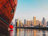 Marina sightseeing dhow cruise passing the skyline
