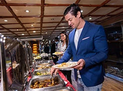 Dubai Water Canal dinner cruise at night
