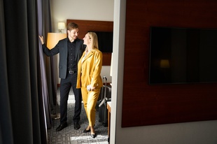 Guest checking in to a hotel abroad