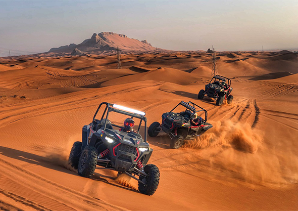 Can-Am Maverick X3 RR Turbo dune buggy on the Dubai desert dunes