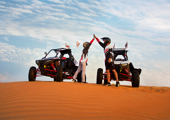 Polaris RS1 single-seat dune buggy on a Dubai desert dune