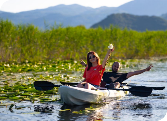 Kayaker photographing wildlife and the skyline from the Eastern Mangrove Lagoon National Park