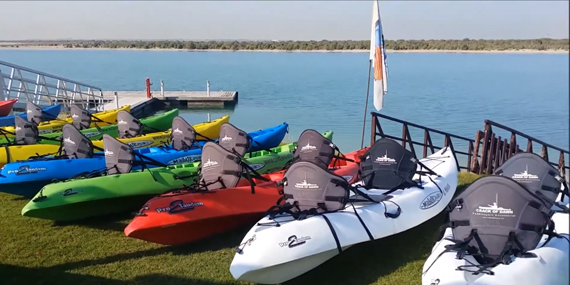 Sunset kayaking session near Yas Links Golf Club on Yas Island, Abu Dhabi
