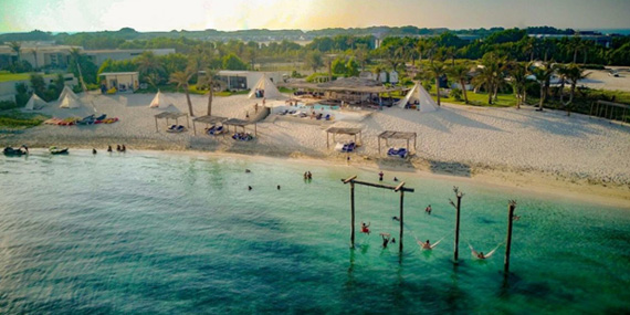 Turquoise water and white sand at Zaya Nurai Island, a kayaking and paddleboarding spot near Abu Dhabi