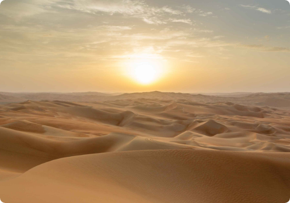 Sun rising over the dunes of the Rub al Khali Empty Quarter