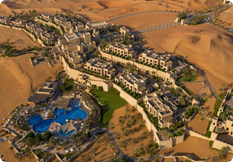 Aerial view of Qasr Al Sarab desert resort among the Liwa dunes