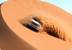 White 4x4 on a guided self-drive across the Liwa Empty Quarter