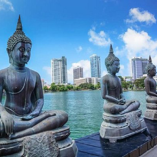Buddha statues overlooking Beira Lake in Colombo, Sri Lanka